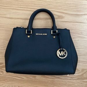 Michael Kors black purse with removable shoulder strap